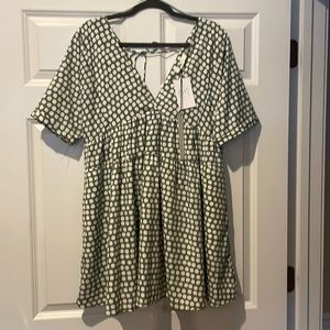 NWT- Short sleeved Boutique Dress -Green and White polka dotted dress. Size M.